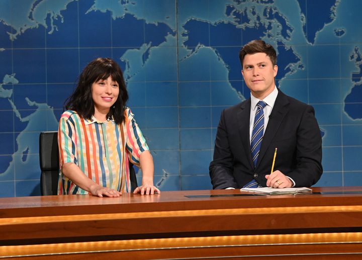 Melissa Villaseñor and anchor Colin Jost during Weekend Update.
