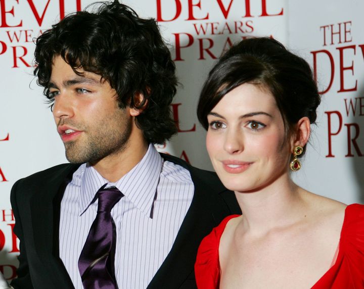 (L-R) Adrian Grenier and Anne Hathaway attend the US premiere of The Devil Wears Prada.