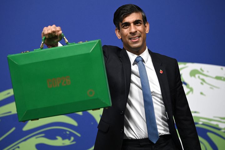Rishi Sunak, then the chancellor, poses with a green briefcase at the Cop26 summit in Glasgow in 2021.