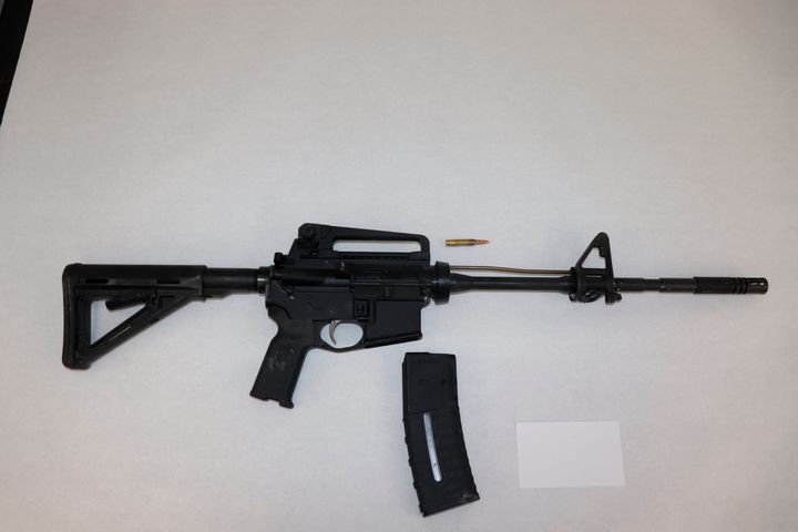 This image provided by the St. Louis Metropolitan Police Department shows an AR-15-style rifle used by a 19-year-old gunman who killed a teacher and a 15-year-old girl at a St. Louis high school on Oct. 24, 2022. 