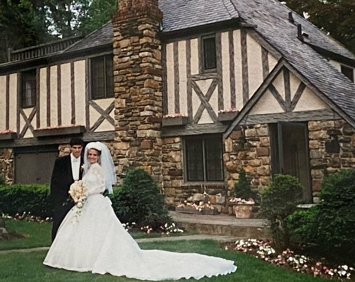 The author and her husband, Tomer, on their wedding day in May 1995. "The Terrifying Tudor is behind us," she writes. "It looks kind of charming in retrospect but that wasn’t the case back then!"