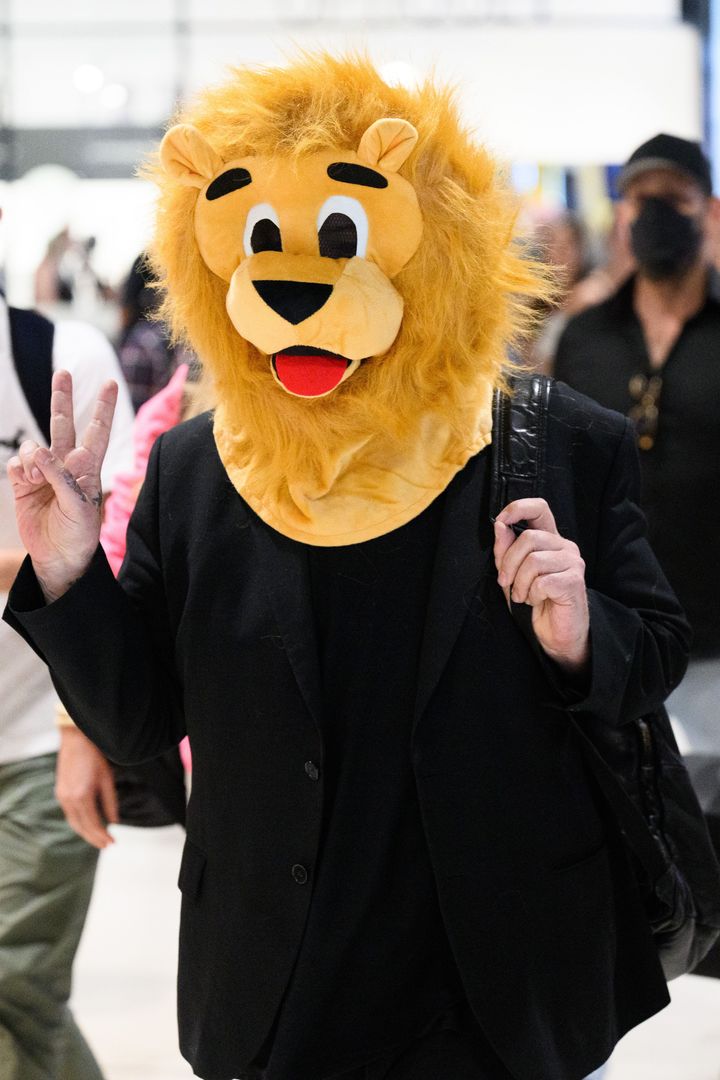 Boy George wore a Lion Mask as he arrived at Brisbane Airport, Australia.