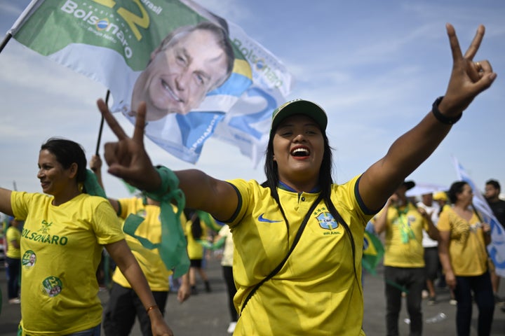 Brazil's famous yellow soccer shirt has taken on renewed political significance over the last decade, especially under President Jair Bolsonaro, whose backers often wear the shirt to show their support for the right-wing leader.