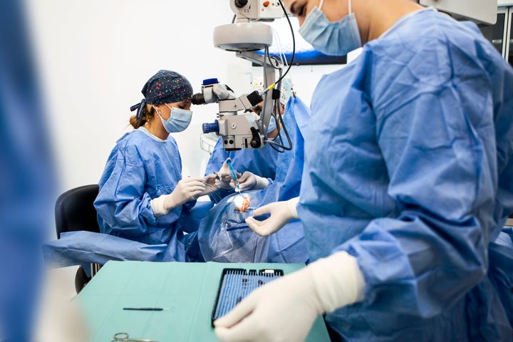 Ophthalmic surgeon performing an eye surgery at the hospital