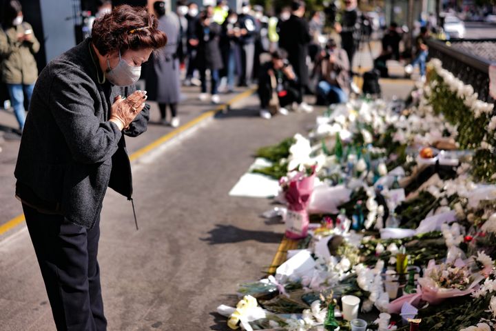 A mourner visits the site of the incident and pays tribute the site of the Itaewon disasters, Yongsan on October 31, 2022 in Seoul, South Korea.