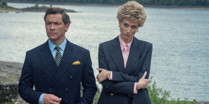 Elizabeth in character with co-star Dominic West
