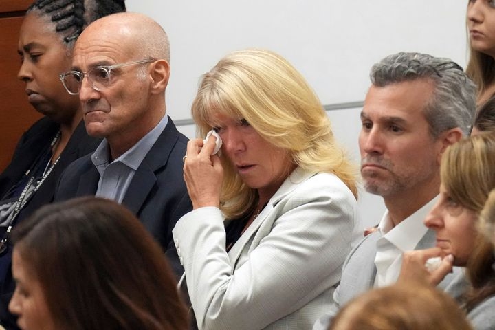 Mitch and Annika Dworet react as they hear that their son's murderer will not receive the death penalty at the Broward County Courthouse in Fort Lauderdale on Oct. 13.