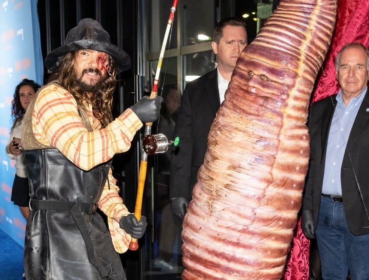 Halloween Queen Heidi Klum Unrecognizable In Giant Worm Costume 2 Heidi Klum and husband Tom Kaulitz dressed up as a worm and a fisherman, respectively.