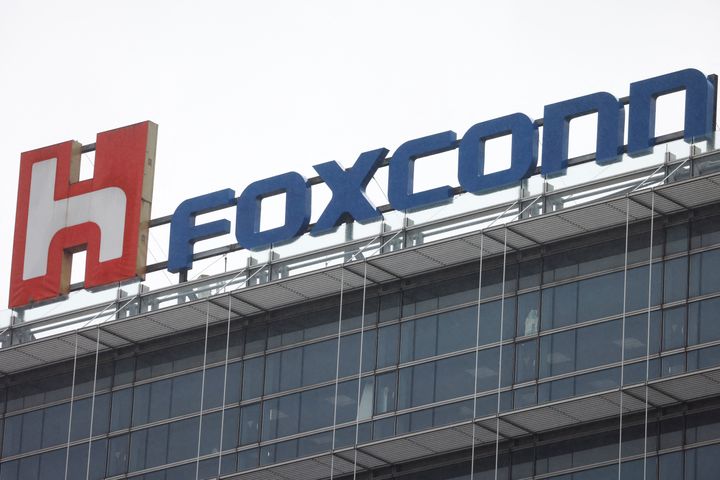 The logo of Foxconn is pictured on top of a company's building in Taipei, Taiwan October 31, 2022. REUTERS/Carlos Garcia Rawlins