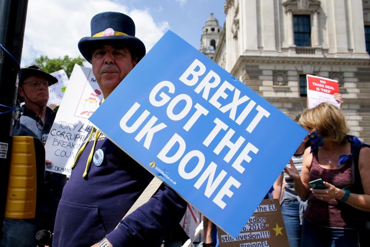 Anti-Brexit activists marking the fifth anniversary of the UK's EU membership referendum demonstrate outside the Houses of Parliament.