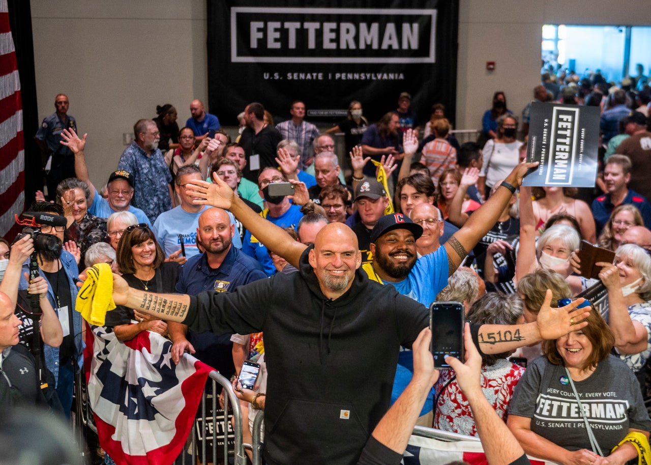Pennsylvania Lt. Gov. John Fetterman takes photos with supporters Aug. 12 following a rally for his U.S. Senate bid at the Bayfront Convention Center in Erie.