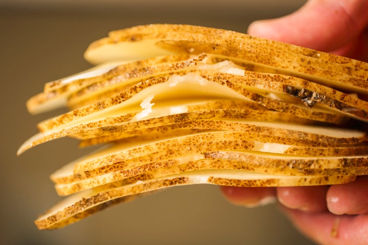 Don't even bother with a knife. A mandoline will produce these perfectly uniform slices in seconds.
