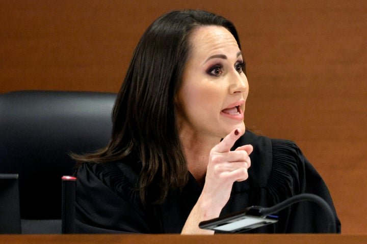 Judge Elizabeth Scherer orders Chief Assistant Public Defender David Wheeler to sit in the back of the courtroom during the sentencing hearing for Marjory Stoneman Douglas High School shooter Nikolas Cruz at the Broward County Courthouse in Fort Lauderdale, Fla. on Tuesday, Nov. 1, 2022. Cruz was sentenced to life in prison for murdering 17 people at Parkland's Marjory Stoneman Douglas High School more than four years ago. (Amy Beth Bennett/South Florida Sun Sentinel via AP, Pool)