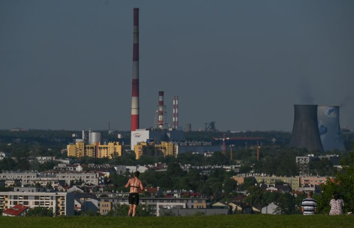 In a photo from mid 2022, coal plants loom over Krakow's Nowa Huta neighborhood. 