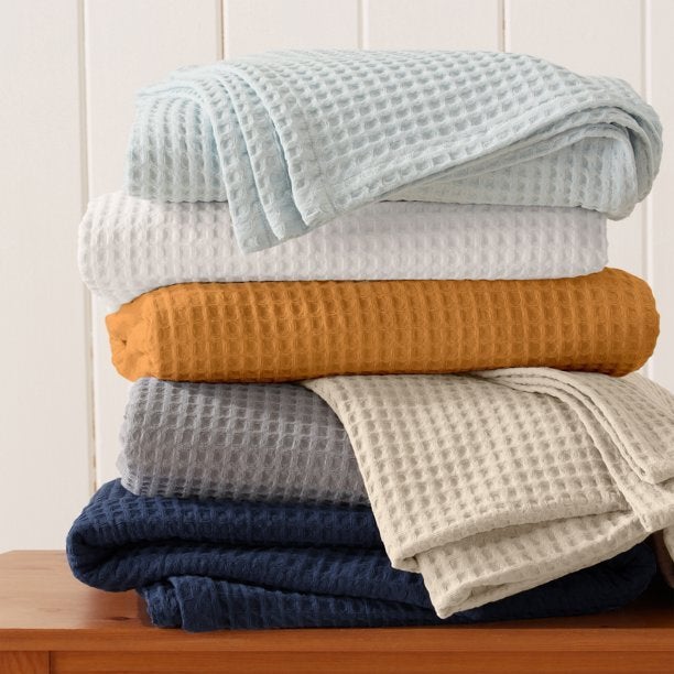 This Waffle-Knit Throw Blanket Looks Much More Expensive Than It Is This Waffle-Knit Throw Blanket Looks Much More Expensive Than It Is