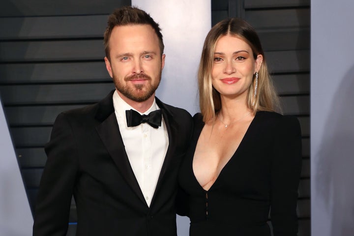 Aaron Paul and wife Lauren Parsekian, pictured in 2018, will now be legally known as Aaron Paul and Lauren Paul.