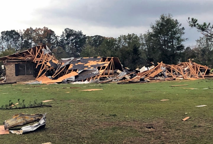Scenes of devastation are visible in all directions along Lamar County Road 35940, west of State Highway 271, after a massive tornado hit the area, causing extensive damage and destroying an unknown number of homes, Friday, Nov. 4, 2022 in Powderly, Texas.