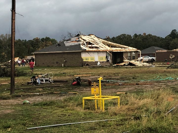 Scenes of devastation are visible in all directions along Lamar County Road 35940, west of State Highway 271, after a massive tornado hit the area, causing extensive damage and destroying an unknown number of homes, Friday, Nov. 4, 2022 in Powderly, Texas.