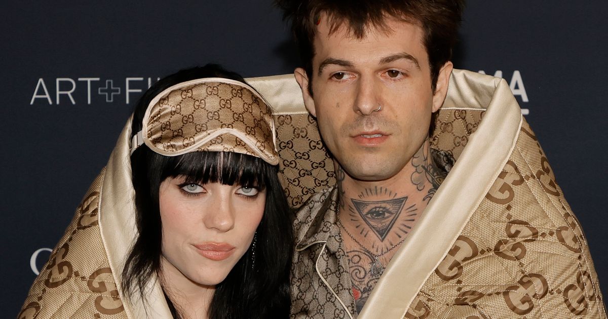 Billie Eilish Makes Red Carpet Debut With Boyfriend Jesse Rutherford Wrapped In Blanket