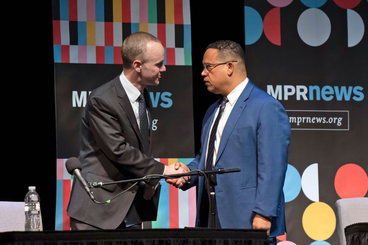 Republican challenger Jim Schultz (left) and Ellison shake hands before an Oct. 14 debate. Ellison argues that Schultz is not really a "moderate."