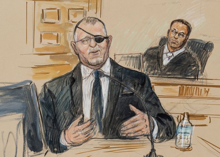 This artist sketch depicts the trial of Oath Keepers leader Stewart Rhodes as he testifies Monday before U.S. District Judge Amit Mehta on charges of seditious conspiracy in the Jan. 6, 2021, Capitol attack.