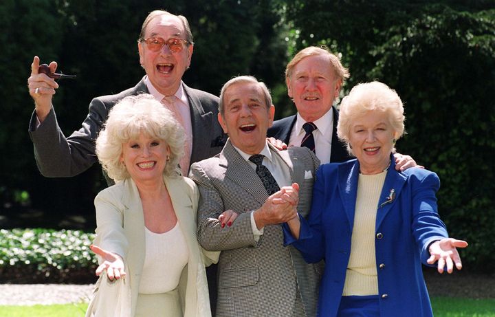 Veteran Carry On film stars Jack Douglas (back left), Leslie Phillips (right rear), Barbara Windsor (front left) and June Whitfield with guest and comic actor Norman Wisdom, centre, (who did not star in any of the films)