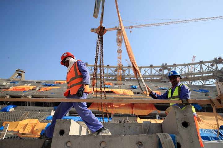 Construction workers continue working on the Lusail Stadium in Lusail, Qatar.