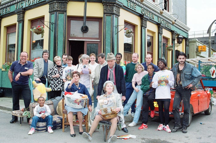 The cast of EastEnders pose together in 1991