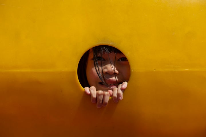 The girl was alone in the playground.