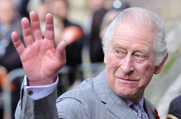 King Charles III waves to well-wishers as he arrives for the Welcoming Ceremony to the City of York at Micklegate Bar with Camilla, Queen Consort