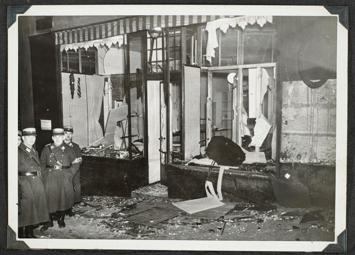 Firefighters, SS special police officers and members of the general public are all seen in the photos participating in the Kristallnacht. 