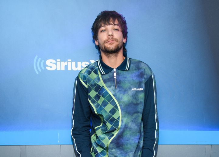 Louis Tomlinson praises Harry Styles' solo success but admits it 'bothered'  him at first