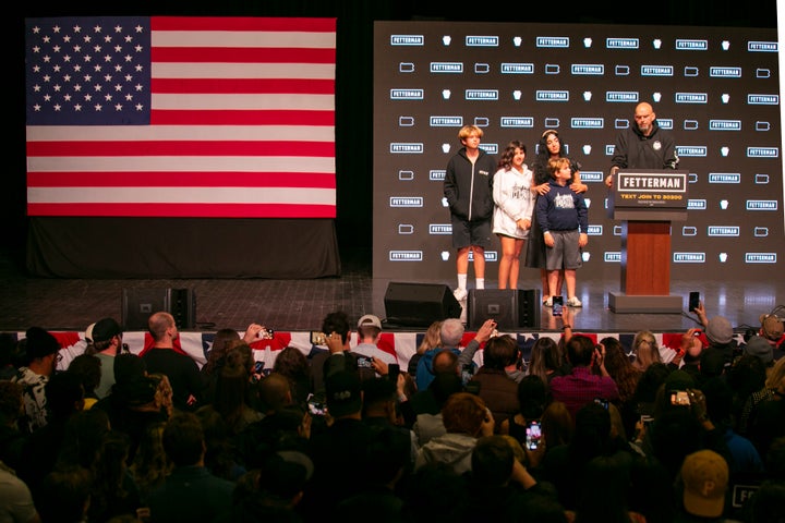 Democrat John Fetterman stands with his kids, from left, Karl, Grace, August and wife Gisele Barreto Fetterman, after winning Pennsylvania's race for U.S. Senate in Pittsburgh, Pennsylvania, on Wednesday, November 9, 2022. (AP Photo/Ted Shaffrey)