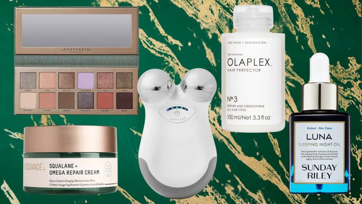 The squalane omega repair cream from Biossance, the Nouveau eyeshadow palette by Anastasia Beverly Hills, the Trinity NuFace micro current device, Olaplex hair perfector treatment and Sunday Riley's Luna Oil.