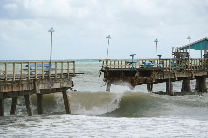 Part of Anglin's Fishing Pier is shown after it collapsed into the ocean after Hurricane Nicole arrived Thursday in Lauderdale-by-the-Sea.