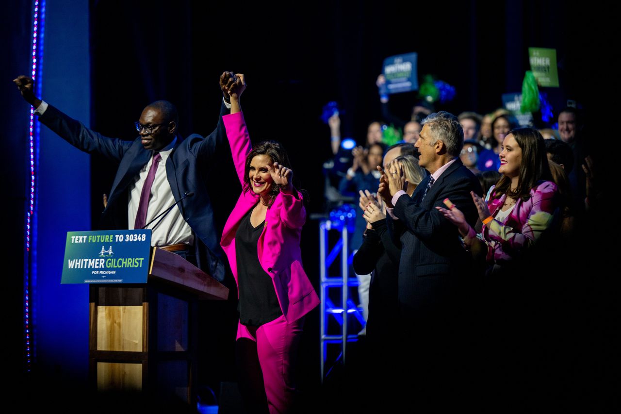 Lt. Gov. Garlin Gilchrist II and Gov. Gretchen Whitmer celebrate at an election night watch party early Wednesday at a Detroit hotel. Whitmer defeated Republican challenger Tudor Dixon.