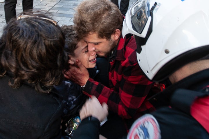 A boy affected by the blast who was separated from his parents is cared for after an explosion on Istiklal street, a busy pedestrian thoroughfare on November 13, 2022 in Istanbul, Turkey. It is unclear what caused the explosion that left at least six people dead and dozens injured, according to the city’s governor. The previous terrorist attack in Istanbul was in 2017, a nightclub mass shooting incident killing 39 people and wounded 79 others.