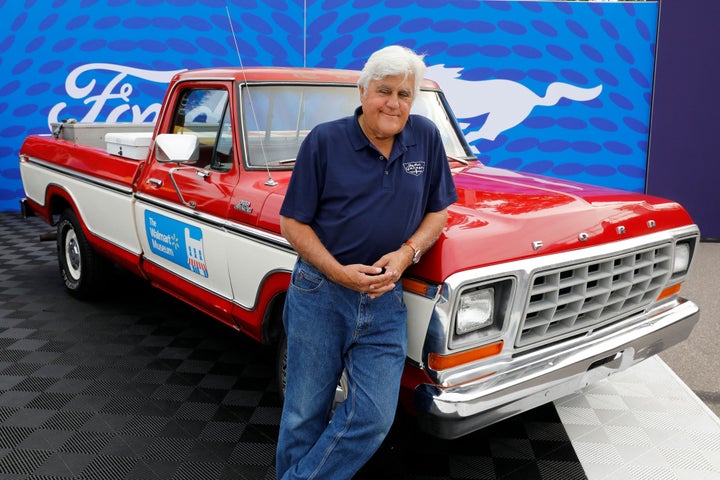 Comedian Jay Leno poses in front of a 1979 Ford F-150 pickup this past August.