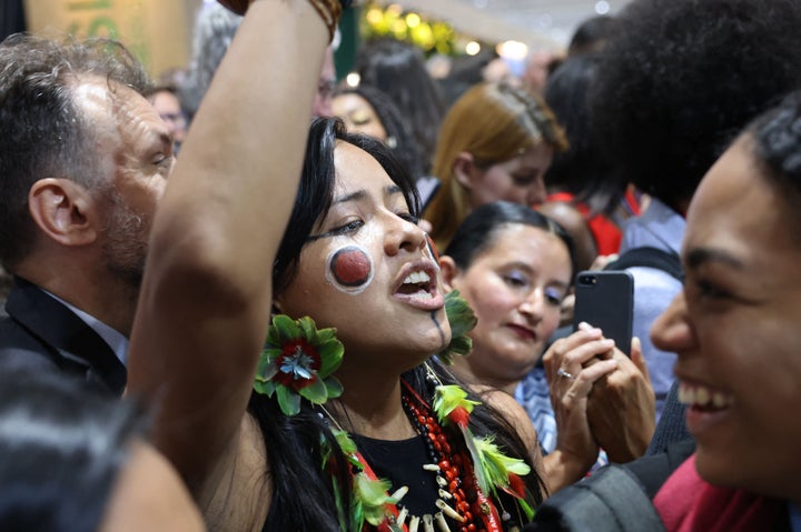 A picture shows people attending a discussion about the Amazon forest in which Brazilian President-elect Luiz Inácio Lula da Silva participated, during at the COP27 climate conference in Egypt's Red Sea resort city of Sharm el-Sheikh on November 16, 2022.