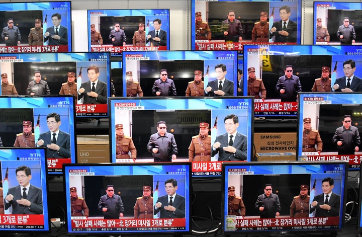 Television screens show a news report about the latest North Korean missile launch with file footage of North Korean leader Kim Jong Un, at an electronic market in Seoul on November 3, 2022. - North Korea fired one long-range and two short-range ballistic missiles on November 3, Seoul's military said, with one prompting warnings for residents of a South Korean island and people in parts of northern Japan to seek shelter. (Photo by Jung Yeon-je / AFP) (Photo by JUNG YEON-JE/AFP via Getty Images)