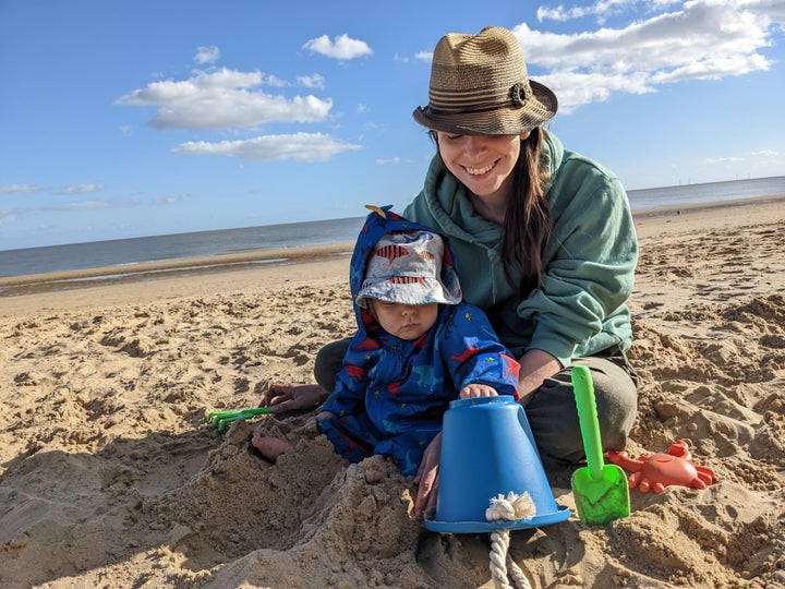 Dolly and her son, who has grown up to be a happy, healthy toddler.