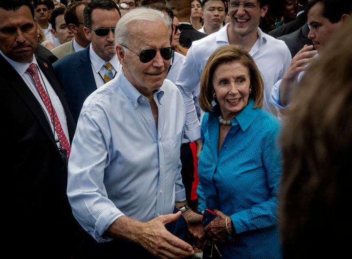 President Joe Biden greets guests with Speaker of the House Nancy Pelosi at the White House Congressional Picnic this past summer. 