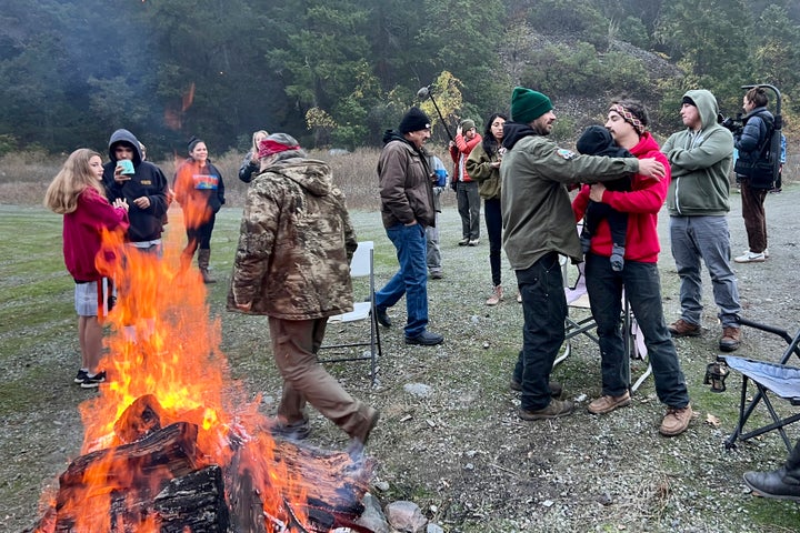 Members of the Yurok, Karuk and Hoopa Valley tribes and other supporters lit a bonfire and watched the vote. (Frankie Myers/Yurok Tribe via AP)