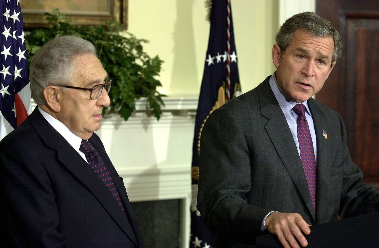 Kissinger with President George W. Bush, who leaned on the former official as an informal adviser throughout the administration's global "war on terror." Kissinger was an ardent supporter of the U.S. invasion of Iraq.
