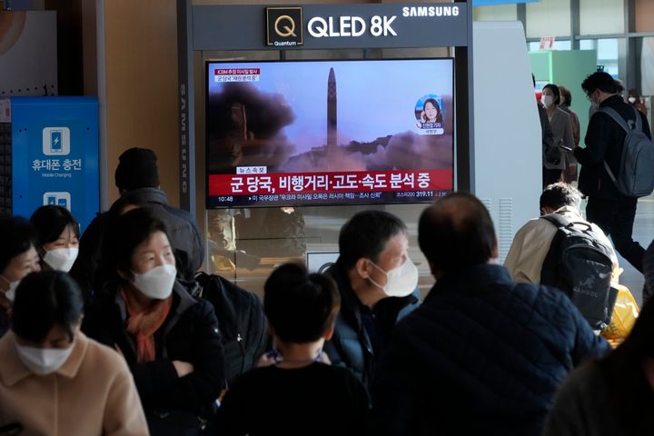 A TV screen shows a file image of North Korea's missile launch during a news program at the Seoul Railway Station in Seoul, South Korea, Friday, Nov. 18, 2022. South Korea says the missile North Korea launched Friday morning is likely an intercontinental ballistic missile. (AP Photo/Ahn Young-joon)