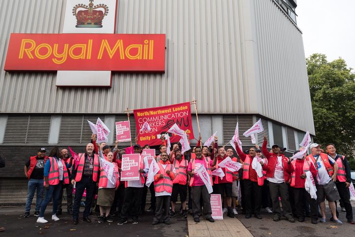 Striking Royal Mail workers on a picket line outside Camden Town Delivery Office when strikes began in September. 