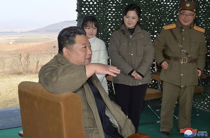 North Korea has unveiled the little-known daughter of its leader Kim Jong Un at a missile launch site.