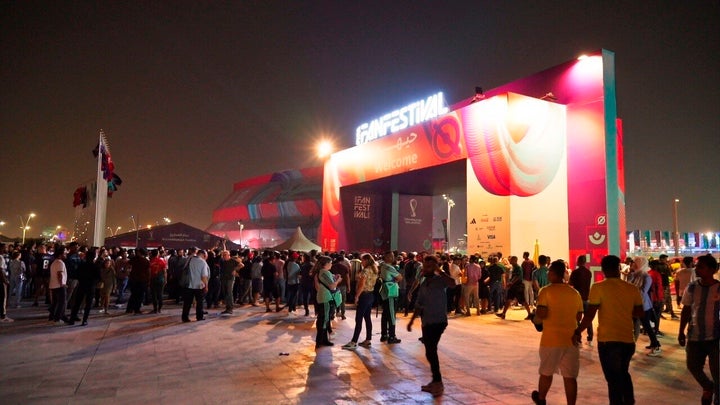 Fans crowd the FIFA Fan Festival site in Doha, Qatar, Saturday, Nov. 19, 2022. Authorities turned away thousands of fans Saturday night from a concert celebrating the World Cup beginning the next day in Qatar, showing the challenges ahead for Doha as it tries to manage crowds in FIFA's most-compact tournament ever. (AP Photo/Jon Gambrell)