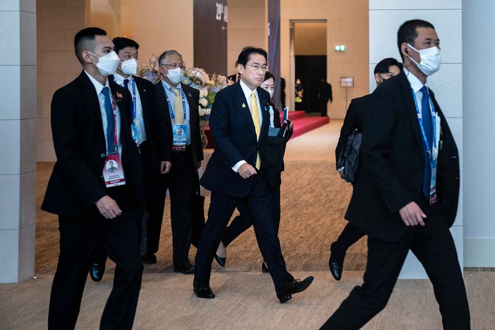 Japan's Prime Minister Fumio Kishida (C) arrives to attend the 29th APEC Economic Leaders Meeting (AELM) during the Asia-Pacific Economic Cooperation (APEC) summit in Bangkok on November 19, 2022. (Photo by Haiyun Jiang / POOL / AFP) (Photo by HAIYUN JIANG/POOL/AFP via Getty Images)