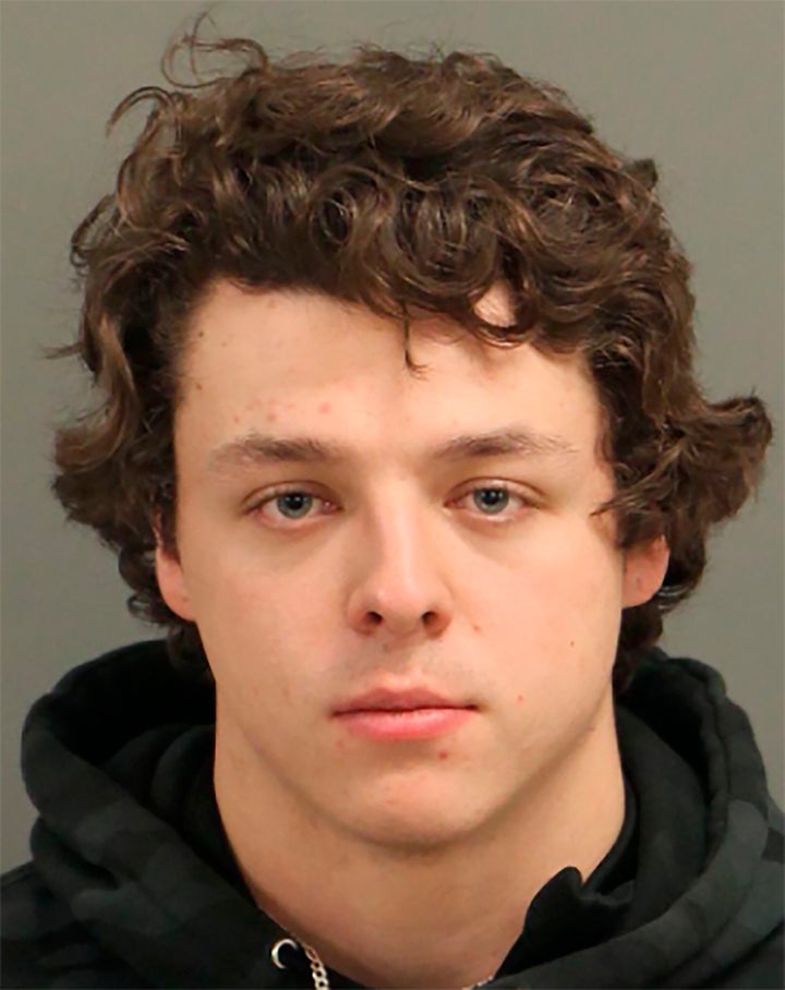 This booking photo released by the Raleigh Police Department shows Landen Christopher Glass who was identified as the driver who lost control.